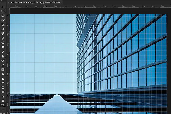 A screenshot showing how to use a grid for editing architecture photography in Photoshop